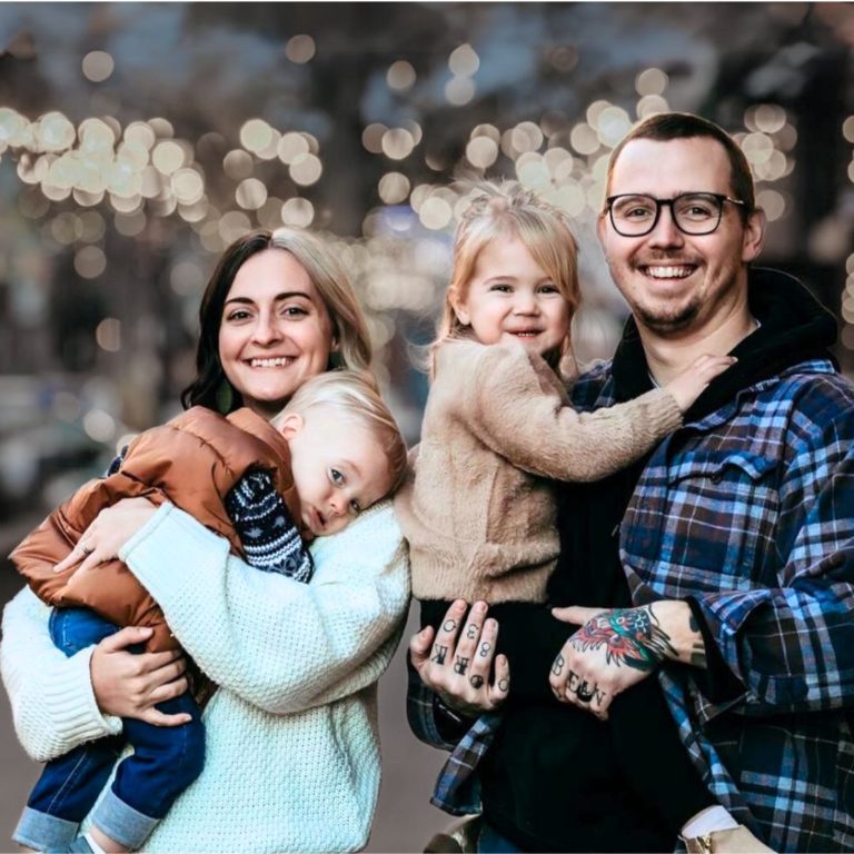 Colorado surrogate program employee and her family.